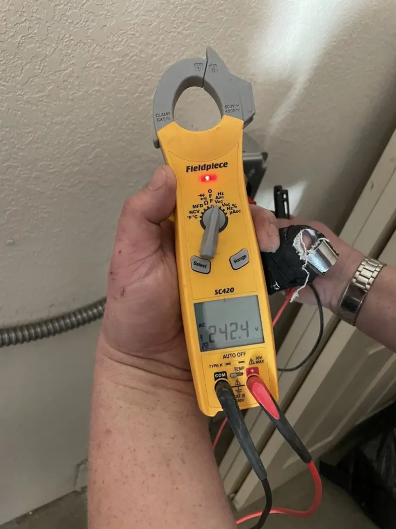 Voltage testing with clamp meter during Circuit Breaker Repair in Nutley